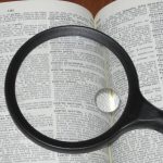 Dictionary with Magnifying Glass