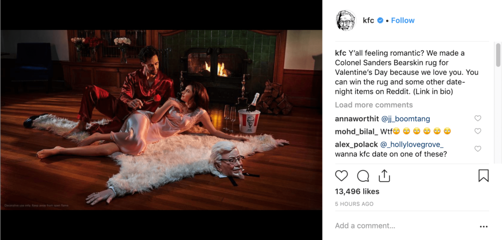 A Valentine's Day ad from KFC featuring a couple lounging before a fireplace on a Colonel Sanders Bearskin rug.