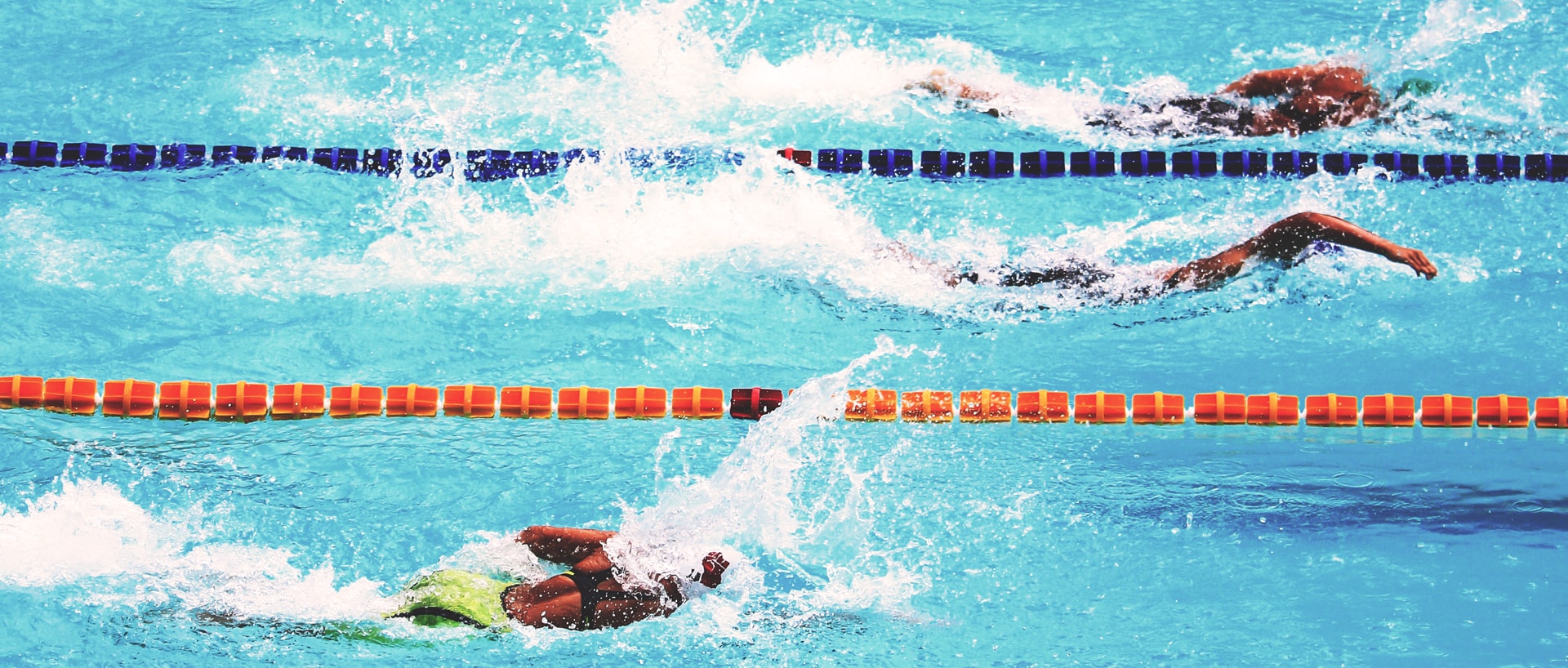Swimmers racing in Lanes